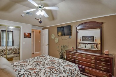 Nestled by the serene orchard of Pecan Plantation, this on Pecan Plantation Country Club in Texas - for sale on GolfHomes.com, golf home, golf lot