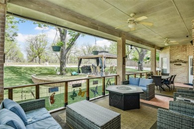 Nestled by the serene orchard of Pecan Plantation, this on Pecan Plantation Country Club in Texas - for sale on GolfHomes.com, golf home, golf lot