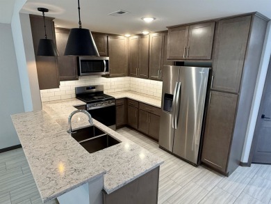 This 3-bedroom, 2-bath condo stands out in the Greater Lakes on Indian Hills Golf Club in Iowa - for sale on GolfHomes.com, golf home, golf lot