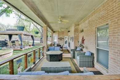 Nestled by the serene orchard of Pecan Plantation, this on Pecan Plantation Country Club in Texas - for sale on GolfHomes.com, golf home, golf lot