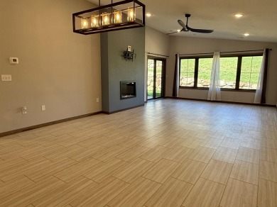 This 3-bedroom, 2-bath condo stands out in the Greater Lakes on Indian Hills Golf Club in Iowa - for sale on GolfHomes.com, golf home, golf lot