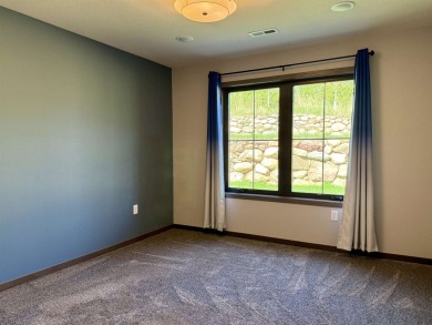 This 3-bedroom, 2-bath condo stands out in the Greater Lakes on Indian Hills Golf Club in Iowa - for sale on GolfHomes.com, golf home, golf lot