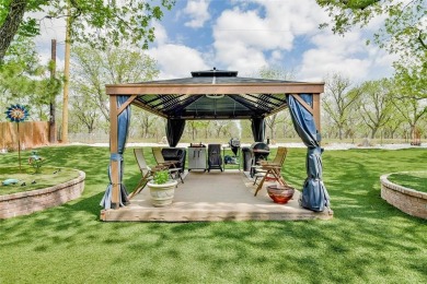 Nestled by the serene orchard of Pecan Plantation, this on Pecan Plantation Country Club in Texas - for sale on GolfHomes.com, golf home, golf lot