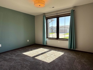 This 3-bedroom, 2-bath condo stands out in the Greater Lakes on Indian Hills Golf Club in Iowa - for sale on GolfHomes.com, golf home, golf lot