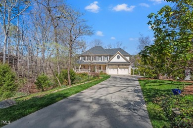 Welcome to your lakeside retreat at MacGregor Downs! Step into on MacGregor Downs Country Club in North Carolina - for sale on GolfHomes.com, golf home, golf lot