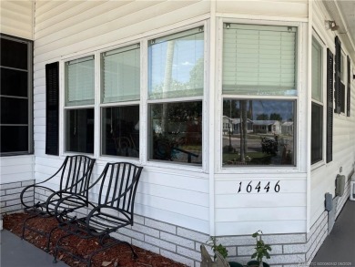 Lovely home with a new A/C in 2021. New washer & dryer and on Indianwood Golf and Country Club in Florida - for sale on GolfHomes.com, golf home, golf lot