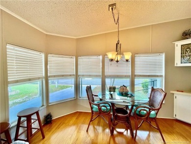 Lovely home with a new A/C in 2021. New washer & dryer and on Indianwood Golf and Country Club in Florida - for sale on GolfHomes.com, golf home, golf lot