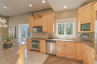 This Exceptional Twin Home sits on a picturesque lot overlooking on Emerald Hills Golf Club in Iowa - for sale on GolfHomes.com, golf home, golf lot