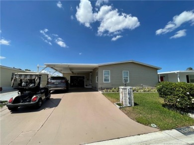 Exquisite home w/a lake & golf course view! Metal roof 3 yrs old on Indianwood Golf and Country Club in Florida - for sale on GolfHomes.com, golf home, golf lot