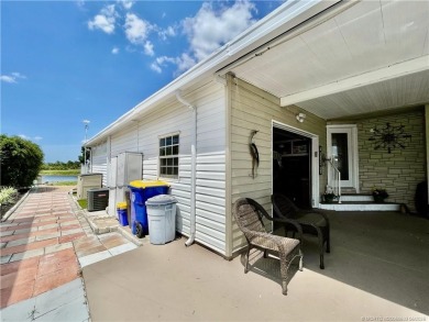 Exquisite home w/a lake & golf course view! Metal roof 3 yrs old on Indianwood Golf and Country Club in Florida - for sale on GolfHomes.com, golf home, golf lot