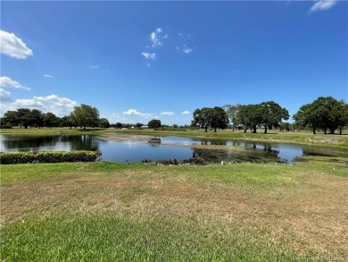 Exquisite home w/a lake & golf course view! Metal roof 3 yrs old on Indianwood Golf and Country Club in Florida - for sale on GolfHomes.com, golf home, golf lot