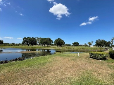 Exquisite home w/a lake & golf course view! Metal roof 3 yrs old on Indianwood Golf and Country Club in Florida - for sale on GolfHomes.com, golf home, golf lot