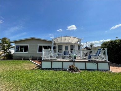 Exquisite home w/a lake & golf course view! Metal roof 3 yrs old on Indianwood Golf and Country Club in Florida - for sale on GolfHomes.com, golf home, golf lot