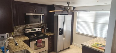 Available April 16, 2026. Showings begin March 16, 2026. NO on Wynmoor Golf Course in Florida - for sale on GolfHomes.com, golf home, golf lot