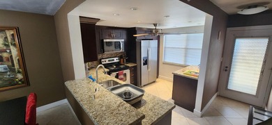 Available April 16, 2026. Showings begin March 16, 2026. NO on Wynmoor Golf Course in Florida - for sale on GolfHomes.com, golf home, golf lot