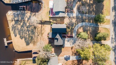 Welcome to this stately brick riverfront home nestled in the on River Bend Golf and Country Club in North Carolina - for sale on GolfHomes.com, golf home, golf lot