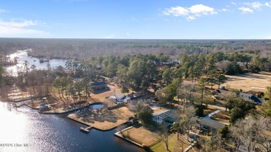 Welcome to this stately brick riverfront home nestled in the on River Bend Golf and Country Club in North Carolina - for sale on GolfHomes.com, golf home, golf lot