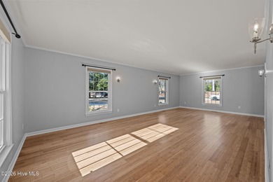 Welcome to this stately brick riverfront home nestled in the on River Bend Golf and Country Club in North Carolina - for sale on GolfHomes.com, golf home, golf lot