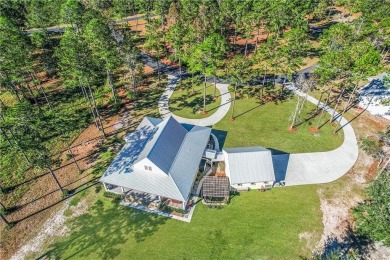 Discover your dream home in the serene waterfront community of on Sapelo Hammock Golf Club in Georgia - for sale on GolfHomes.com, golf home, golf lot