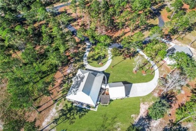 Discover your dream home in the serene waterfront community of on Sapelo Hammock Golf Club in Georgia - for sale on GolfHomes.com, golf home, golf lot