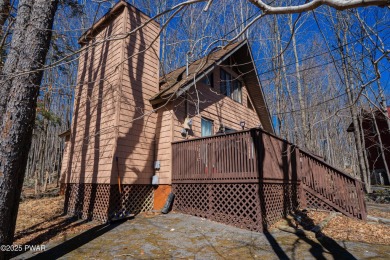 Escape to Your Perfect Poconos Chalet in The Hideout!Tucked away on The Hideout Golf in Pennsylvania - for sale on GolfHomes.com, golf home, golf lot