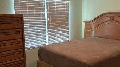 This home has so much to offer!  Pull up to an extended driveway on Sabal Springs Golf and Racquet Club in Florida - for sale on GolfHomes.com, golf home, golf lot