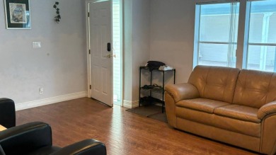 This home has so much to offer!  Pull up to an extended driveway on Sabal Springs Golf and Racquet Club in Florida - for sale on GolfHomes.com, golf home, golf lot