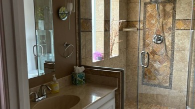 This home has so much to offer!  Pull up to an extended driveway on Sabal Springs Golf and Racquet Club in Florida - for sale on GolfHomes.com, golf home, golf lot