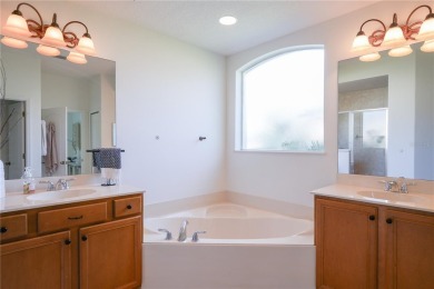 Beyond its picturesque setting and thoughtful layout, this home on Eagle Dunes Golf Club in Florida - for sale on GolfHomes.com, golf home, golf lot