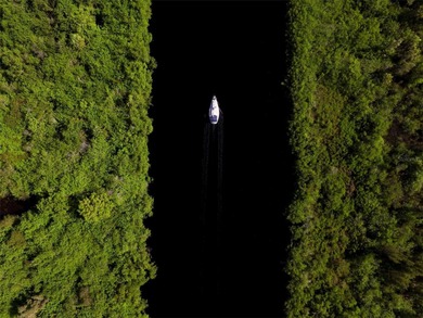 Welcome to luxurious coastal living with true sailboat access to on Rotonda Golf and Country Club - Long Marsh  in Florida - for sale on GolfHomes.com, golf home, golf lot