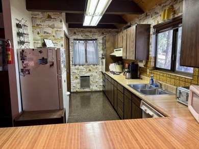 Charming Lake Almanor Country Club Cabin Retreat Escape to this on Lake Almanor Country Club in California - for sale on GolfHomes.com, golf home, golf lot