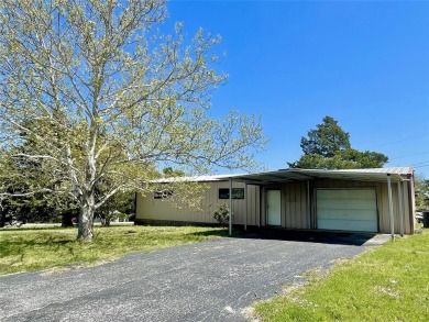 485 Quail Creek Circle, Pottsboro TX is a  rare opportunity to on Tanglewood Resort in Texas - for sale on GolfHomes.com, golf home, golf lot