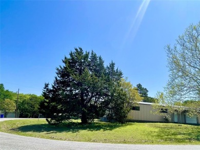 485 Quail Creek Circle, Pottsboro TX is a  rare opportunity to on Tanglewood Resort in Texas - for sale on GolfHomes.com, golf home, golf lot