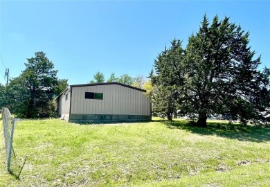 485 Quail Creek Circle, Pottsboro TX is a  rare opportunity to on Tanglewood Resort in Texas - for sale on GolfHomes.com, golf home, golf lot