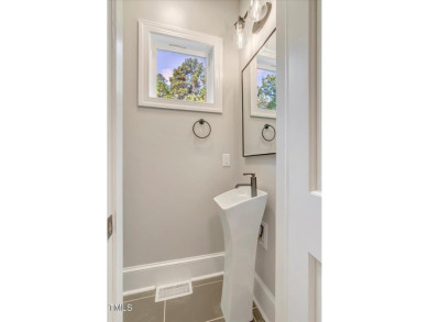 Welcome to this stunning brand new Kerr Lake home in the gated on Kerr Lake Country Club in North Carolina - for sale on GolfHomes.com, golf home, golf lot