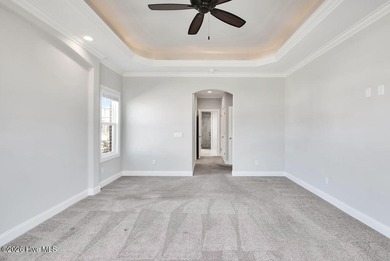 Live the Carolina dream in this all-brick Trusst home perfectly on Compass Pointe Golf Course in North Carolina - for sale on GolfHomes.com, golf home, golf lot