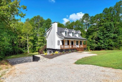 Welcome to this stunning brand new Kerr Lake home in the gated on Kerr Lake Country Club in North Carolina - for sale on GolfHomes.com, golf home, golf lot