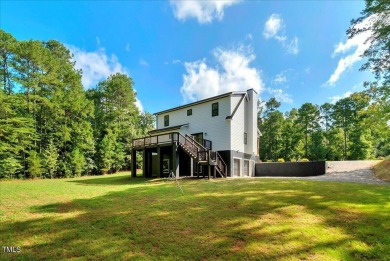Welcome to this stunning brand new Kerr Lake home in the gated on Kerr Lake Country Club in North Carolina - for sale on GolfHomes.com, golf home, golf lot