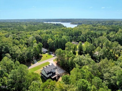 Welcome to this stunning brand new Kerr Lake home in the gated on Kerr Lake Country Club in North Carolina - for sale on GolfHomes.com, golf home, golf lot