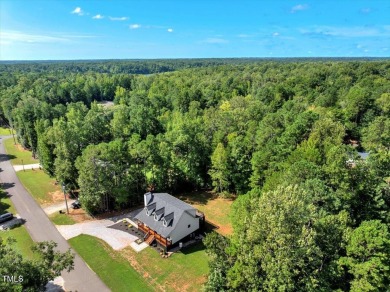Welcome to this stunning brand new Kerr Lake home in the gated on Kerr Lake Country Club in North Carolina - for sale on GolfHomes.com, golf home, golf lot