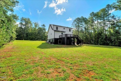 Welcome to this stunning brand new Kerr Lake home in the gated on Kerr Lake Country Club in North Carolina - for sale on GolfHomes.com, golf home, golf lot