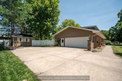 Located in Riverside neighborhood close to elementary, middle on Riverside Country Club in Nebraska - for sale on GolfHomes.com, golf home, golf lot