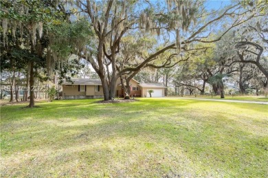 Breathtaking lake front views await you from nearly every room on The Golf Club at Pleasant Point Plantation in South Carolina - for sale on GolfHomes.com, golf home, golf lot