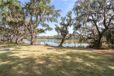 Breathtaking lake front views await you from nearly every room on The Golf Club at Pleasant Point Plantation in South Carolina - for sale on GolfHomes.com, golf home, golf lot