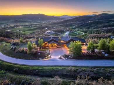 This spectacular home in Alpine Mountain Ranch began with on Catamount Ranch and Club in Colorado - for sale on GolfHomes.com, golf home, golf lot
