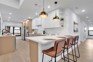 Prepare to be impressed by this fully remodeled Clearwater gem on Countryside Country Club in Florida - for sale on GolfHomes.com, golf home, golf lot