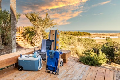 It's not often that an oceanfront home overlooking the 18th hole on Wild Dunes Harbor Golf Resort in South Carolina - for sale on GolfHomes.com, golf home, golf lot