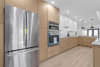 Prepare to be impressed by this fully remodeled Clearwater gem on Countryside Country Club in Florida - for sale on GolfHomes.com, golf home, golf lot