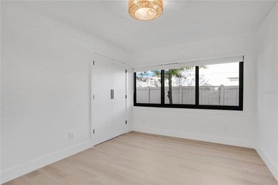 Prepare to be impressed by this fully remodeled Clearwater gem on Countryside Country Club in Florida - for sale on GolfHomes.com, golf home, golf lot