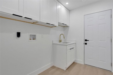 Prepare to be impressed by this fully remodeled Clearwater gem on Countryside Country Club in Florida - for sale on GolfHomes.com, golf home, golf lot